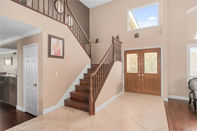 a view of an entryway with staircase