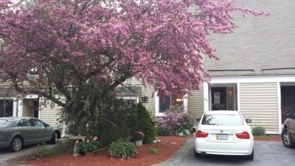 a car parked in front of a house