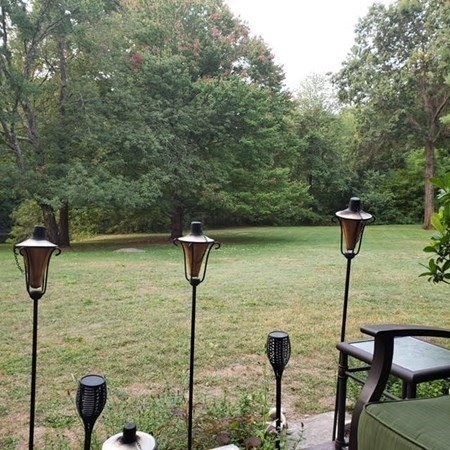 35 Hazen Road, Unit F3 Shirley, MA 01464 - Photo 17 of 22 a backyard of a house with lots of green space