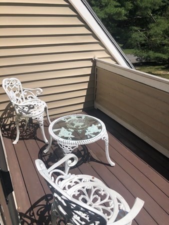35 Hazen Road, Unit F3 Shirley, MA 01464 - Photo 4 of 22 a view of balcony with furniture