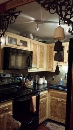 35 Hazen Road, Unit F3 Shirley, MA 01464 - Photo 9 of 22 a kitchen with a stove and a microwave