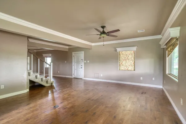 a view of an empty room and window