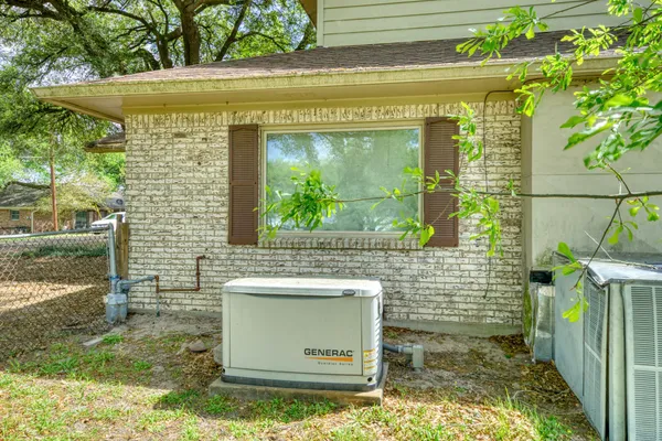 a huge green field with lots of trees