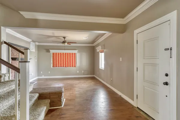 a view of an empty room and window