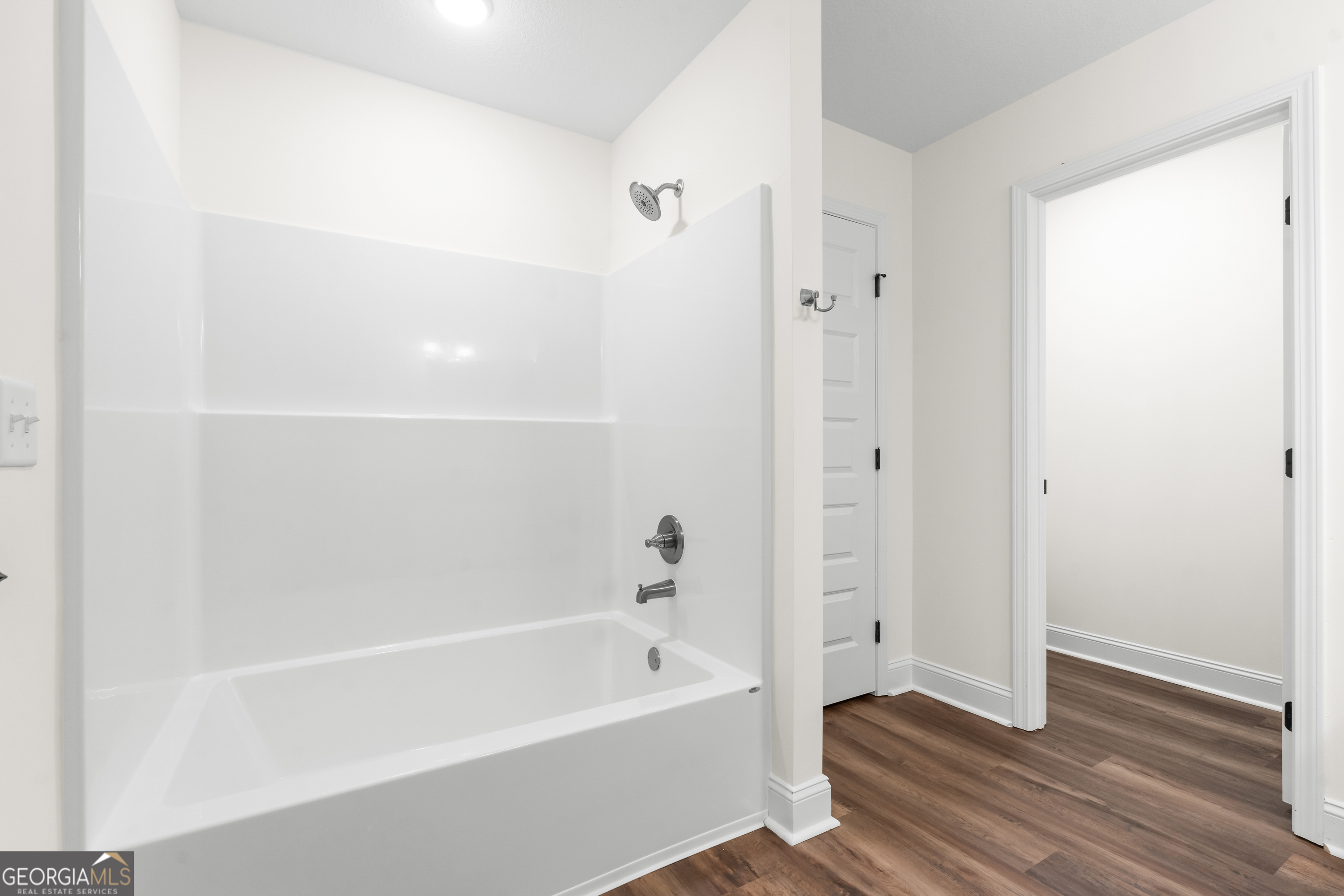 919 Ryegrass Road Statesboro, GA 30458 - Photo 13 of 20 a bathroom with a bathtub and shower