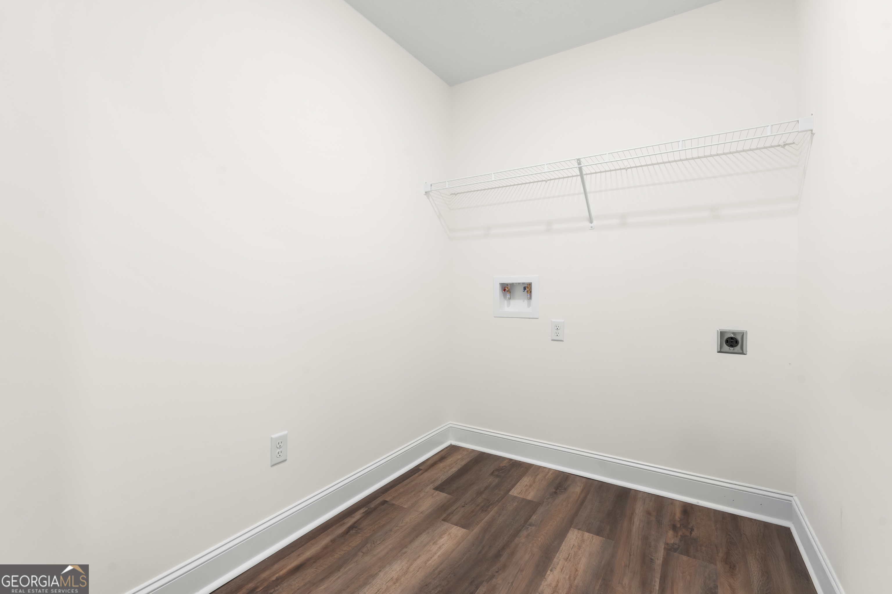 919 Ryegrass Road Statesboro, GA 30458 - Photo 17 of 20 a view of a small space with wooden floor