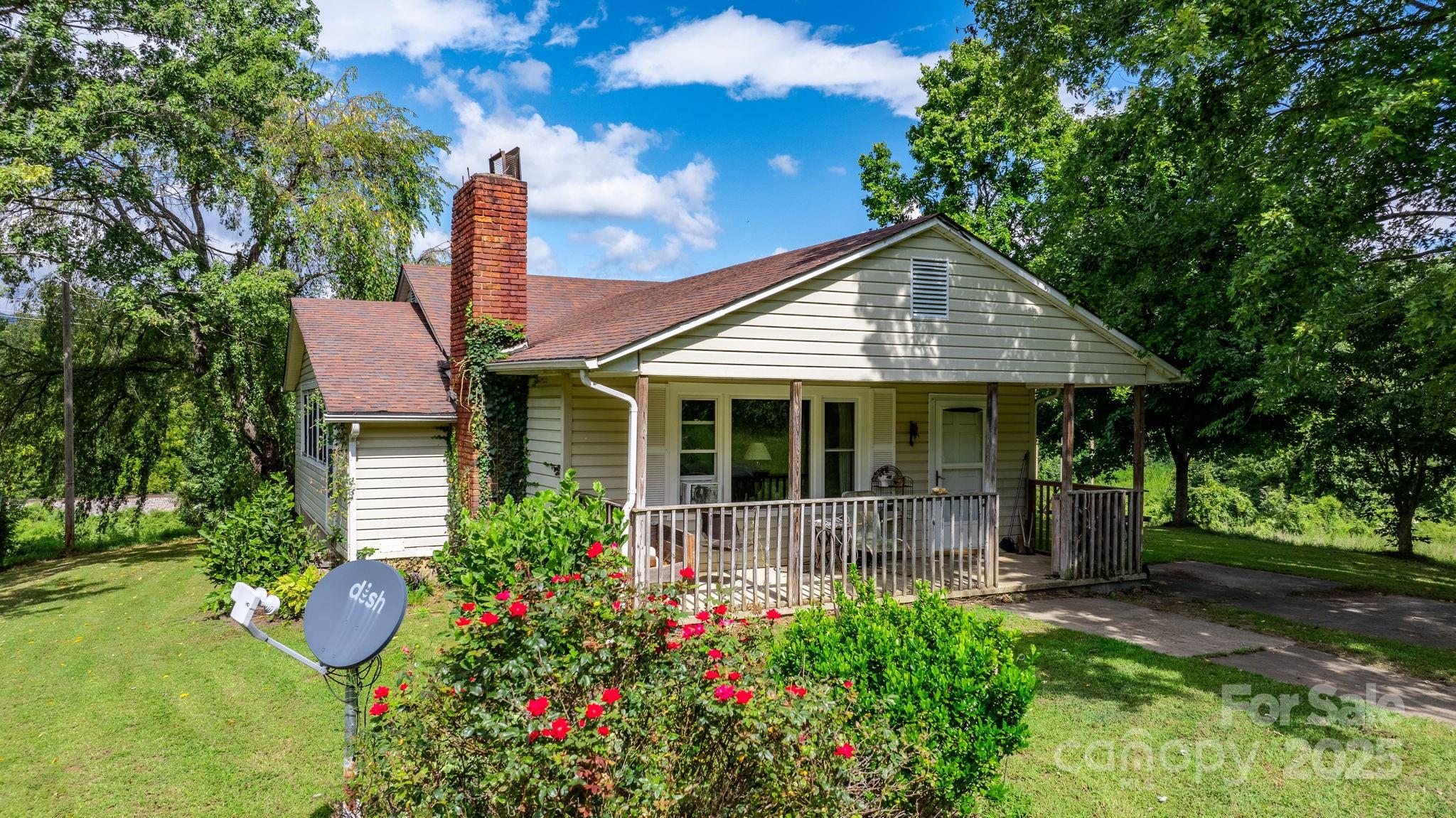 front view of a house with a yard