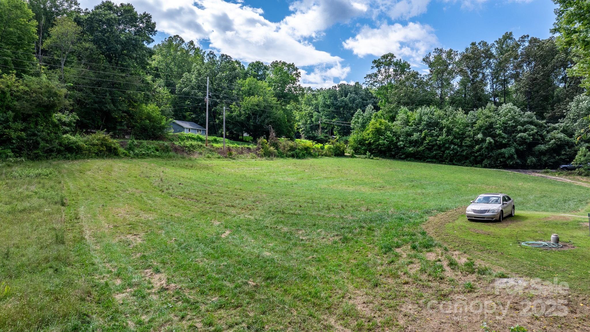 1147 Old Linville Road Marion, NC 28752 - Photo 12 of 27 a view of an outdoor space and a yard