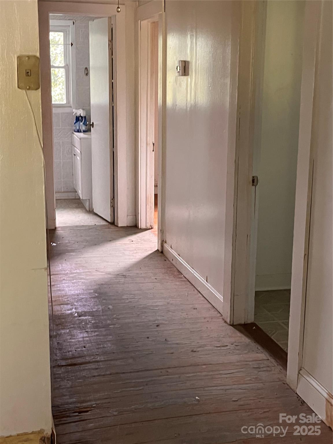 1147 Old Linville Road Marion, NC 28752 - Photo 14 of 27 a view of a bathroom with wooden floor