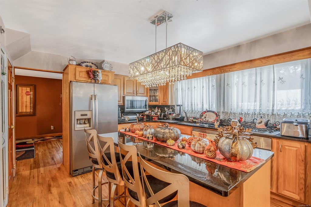 8 Brenner Road Coram, NY 11727 - Photo 11 of 43 a very nice looking kitchen with a large window
