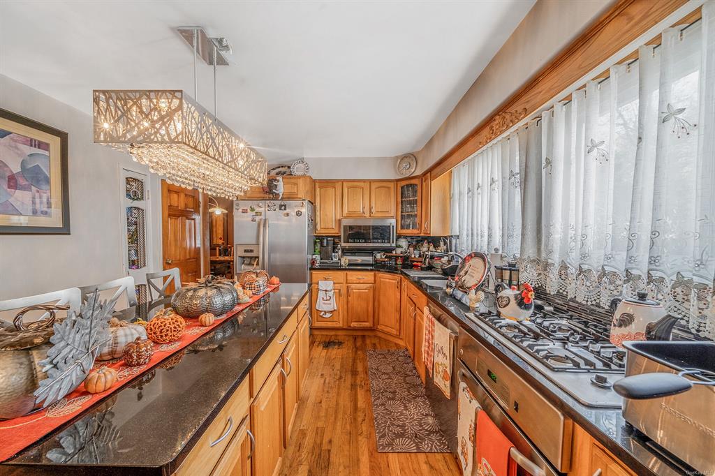 8 Brenner Road Coram, NY 11727 - Photo 12 of 43 a very nice looking kitchen with a large window