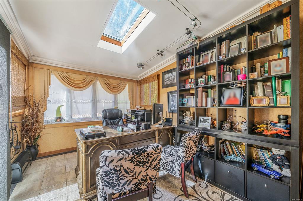 8 Brenner Road Coram, NY 11727 - Photo 15 of 43 a very nice looking room with many windows and furniture