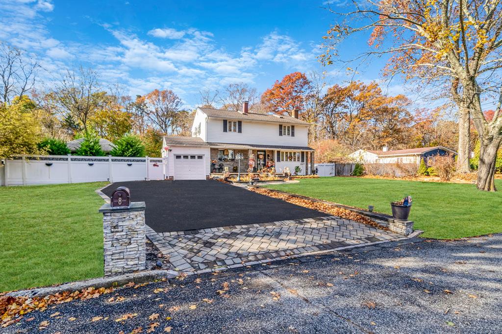8 Brenner Road Coram, NY 11727 - Photo 3 of 43 a view of a house with a yard