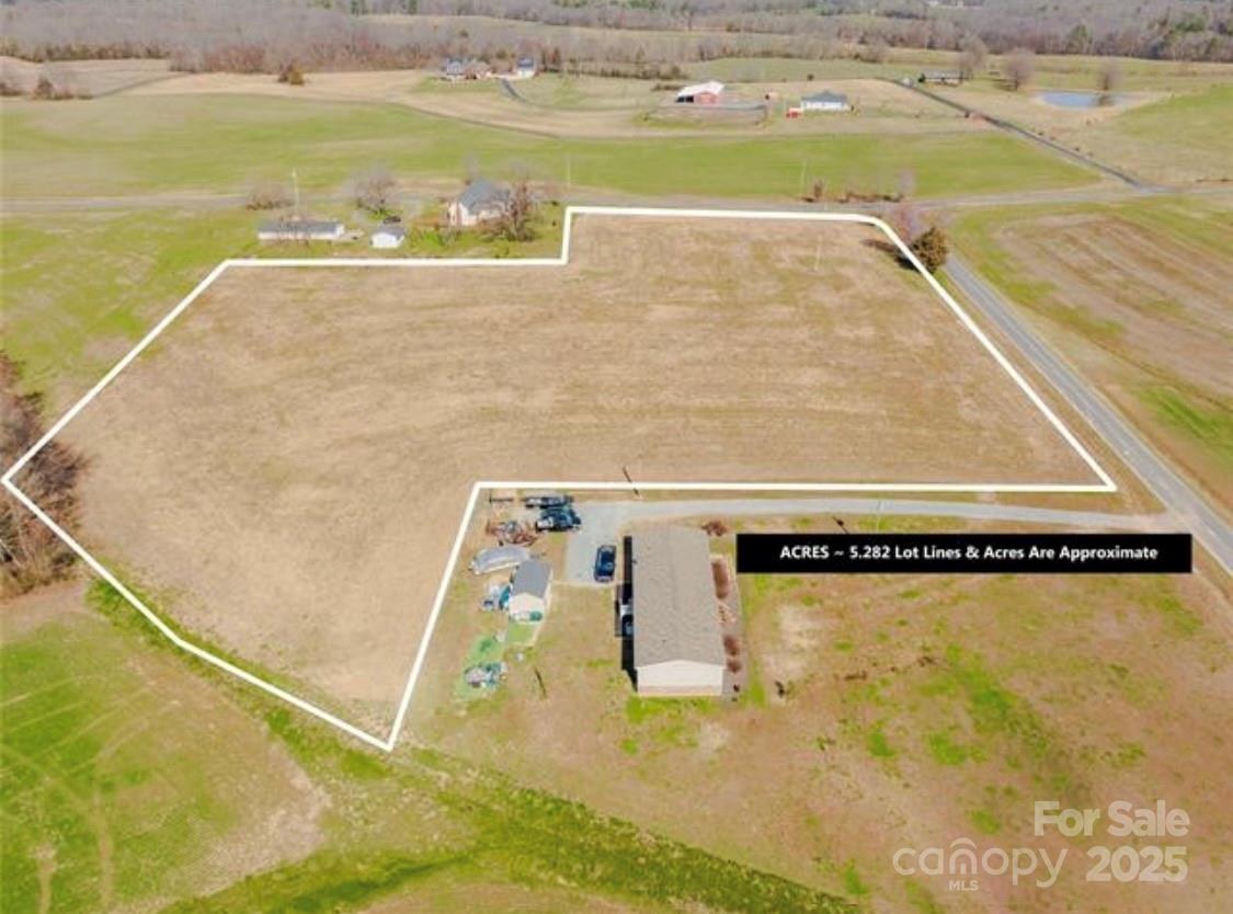 4 Faulks Church Road Wingate, NC 28174 - Photo 12 of 21 a view of a swimming pool