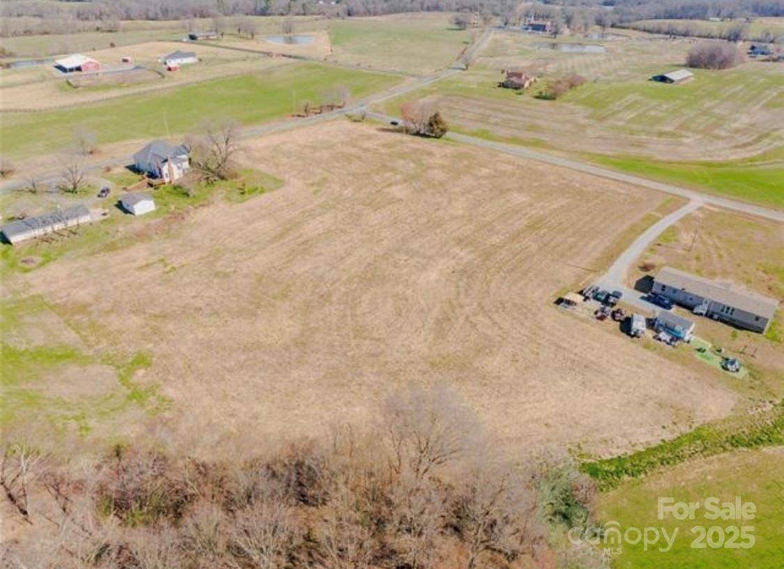 4 Faulks Church Road Wingate, NC 28174 - Photo 20 of 21 a view of a swimming pool with an outdoor space