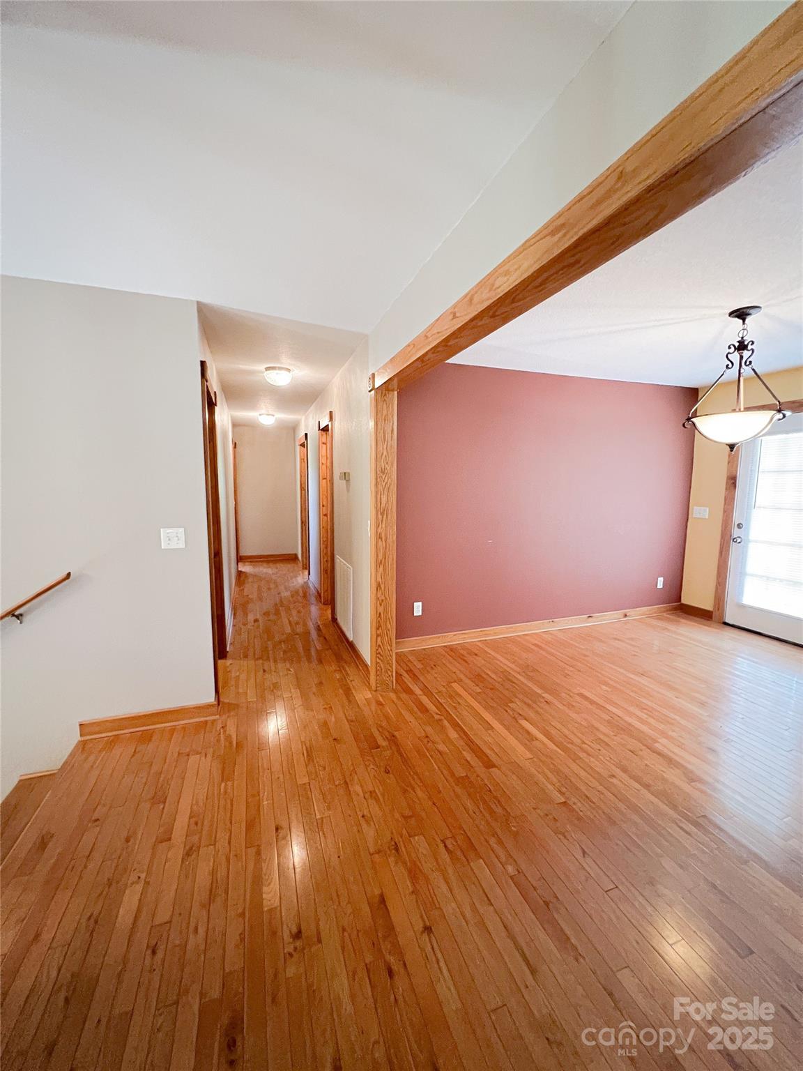 660 Halltown Road Spruce Pine, NC 28777 - Photo 15 of 33 a view of empty room with wooden floor