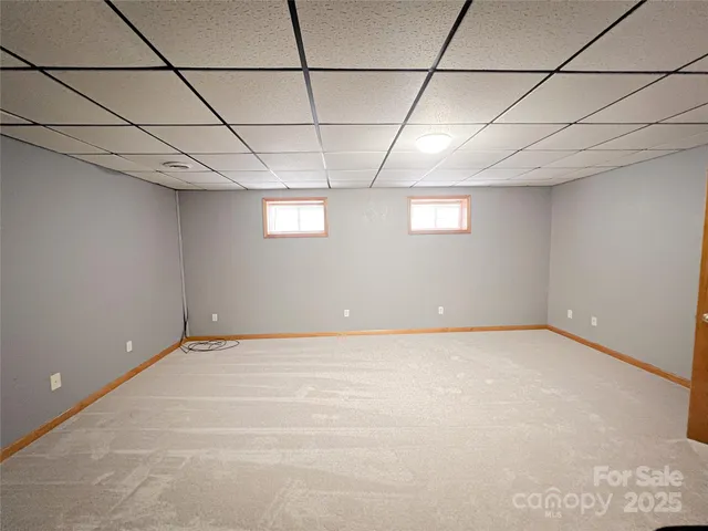 a view of a room with lots of wooden floor