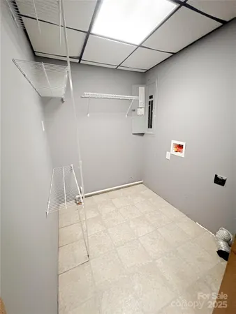 a view of a room with racks on the wall