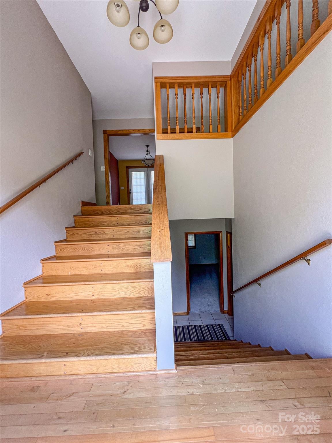 660 Halltown Road Spruce Pine, NC 28777 - Photo 5 of 33 a view of entryway and hall with wooden floor