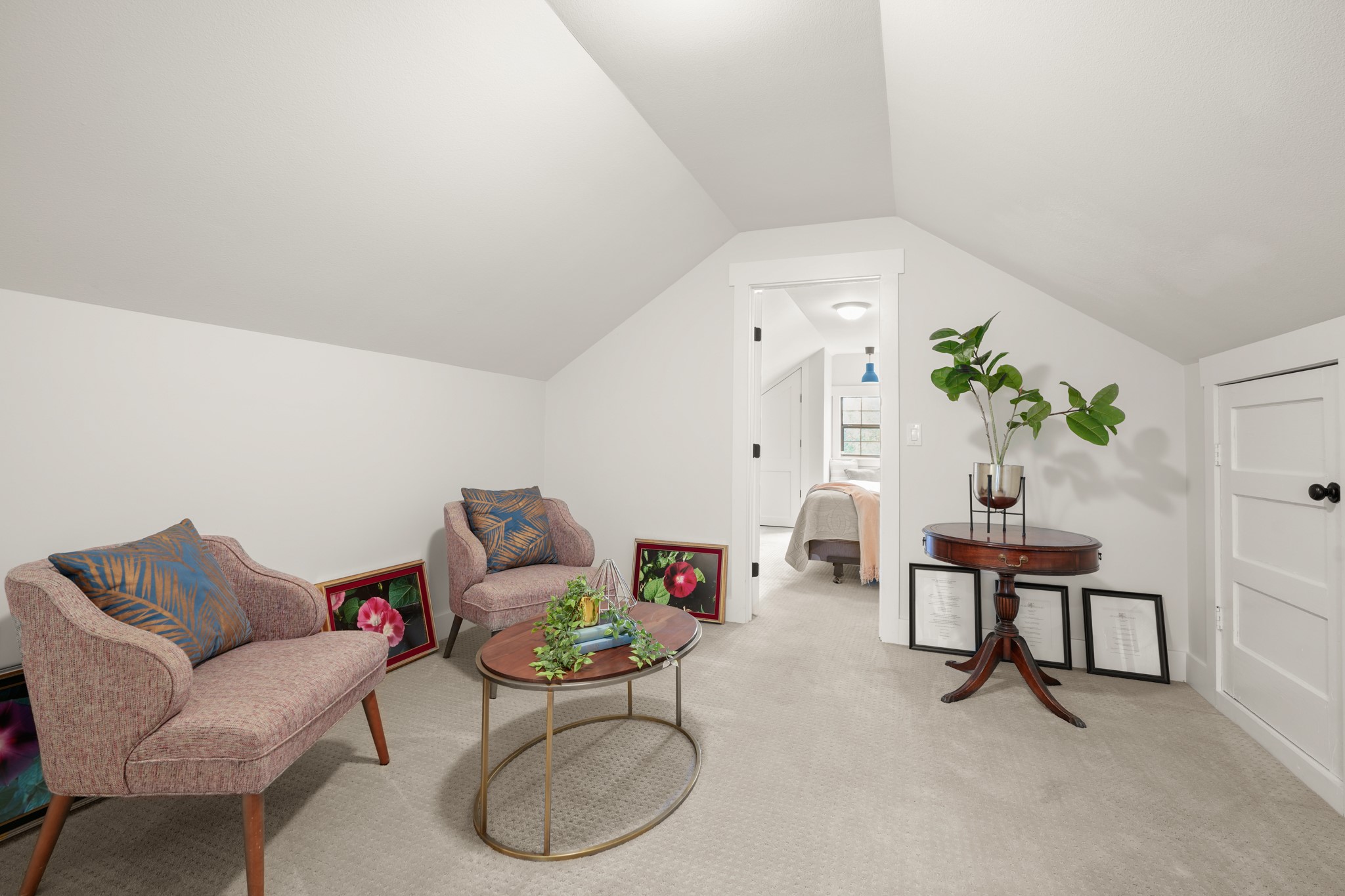 301 Old Thorndale Road Taylor, TX 76574 - Photo 15 of 29 An inviting attic retreat with sloped ceilings provides a cozy sitting area.