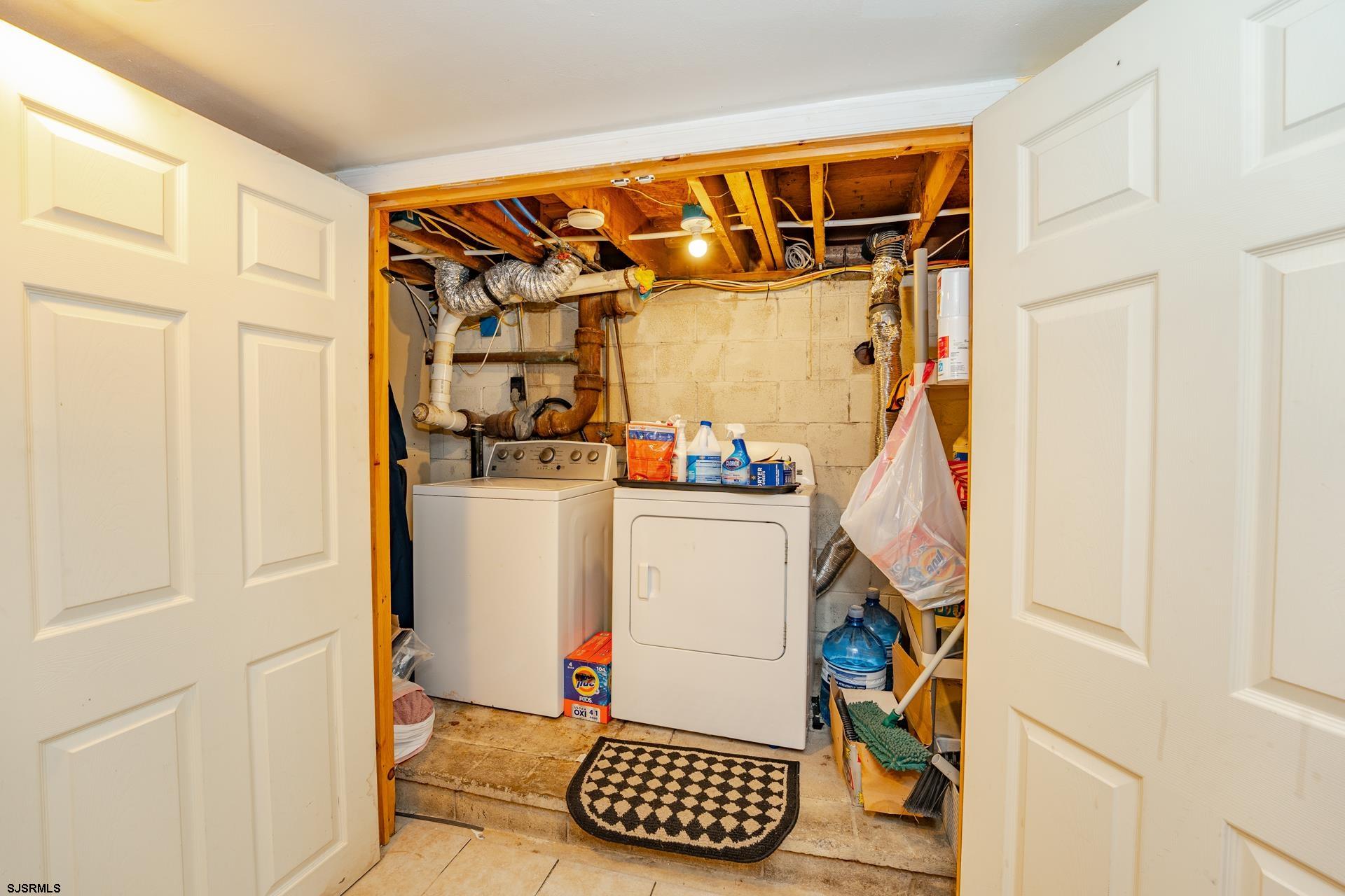 6529 Delilah Road Egg Harbor Township, NJ 08234 - Photo 30 of 70 a view of walk in closet with clothes and shoes