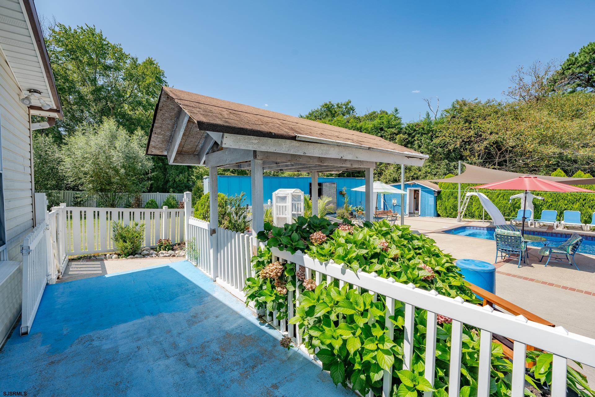 6529 Delilah Road Egg Harbor Township, NJ 08234 - Photo 46 of 70 a view of a garden with patio