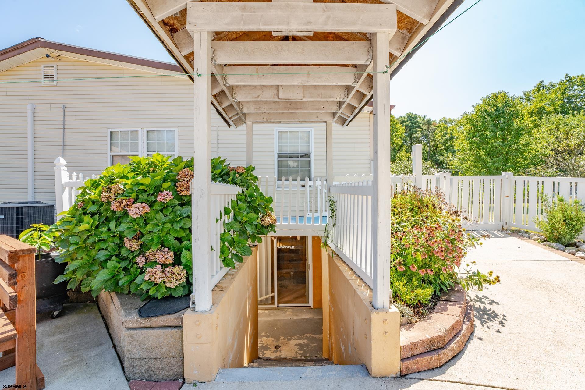 6529 Delilah Road Egg Harbor Township, NJ 08234 - Photo 47 of 70 a front view of a house with a yard