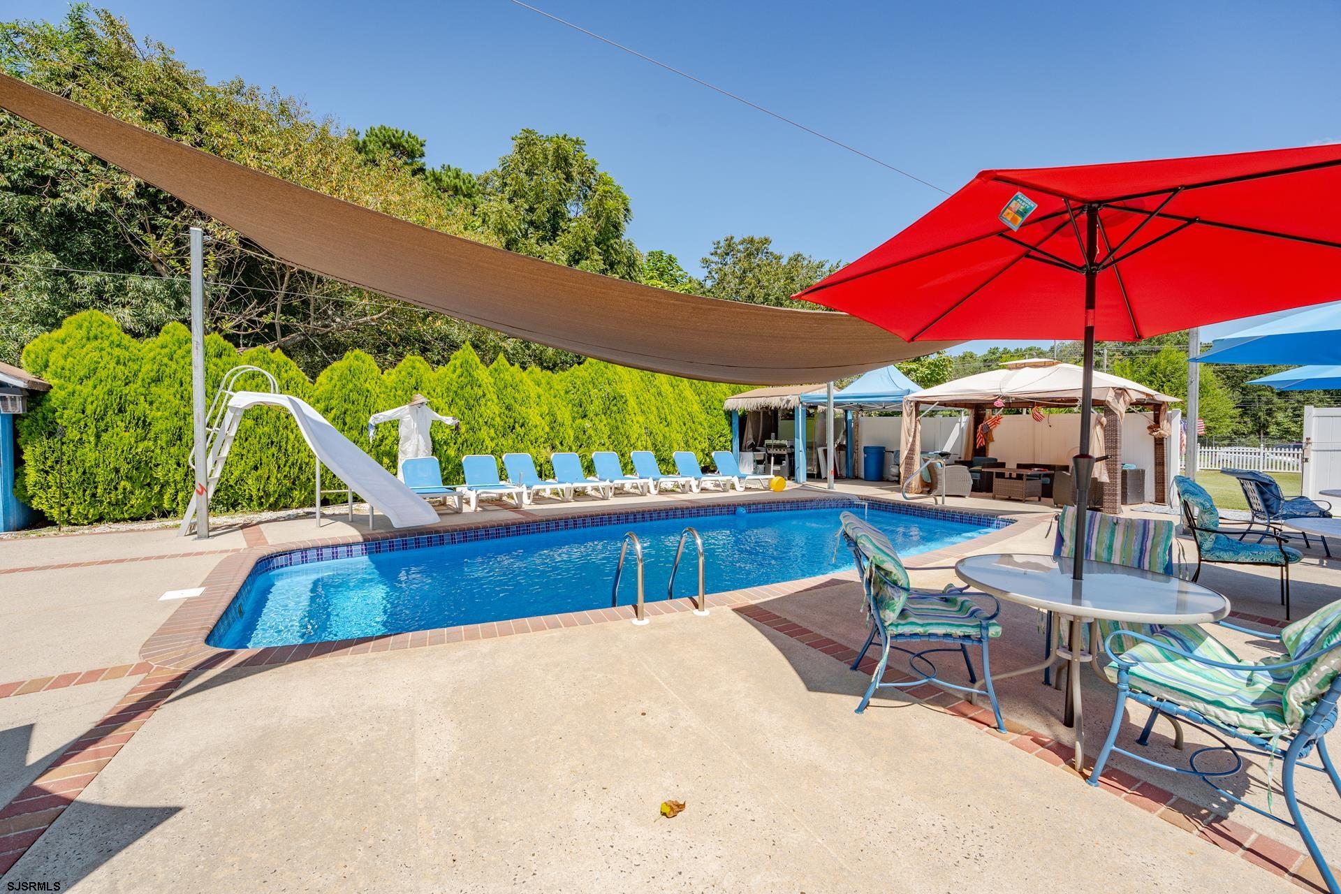 6529 Delilah Road Egg Harbor Township, NJ 08234 - Photo 49 of 70 swimming pool view with a seating space