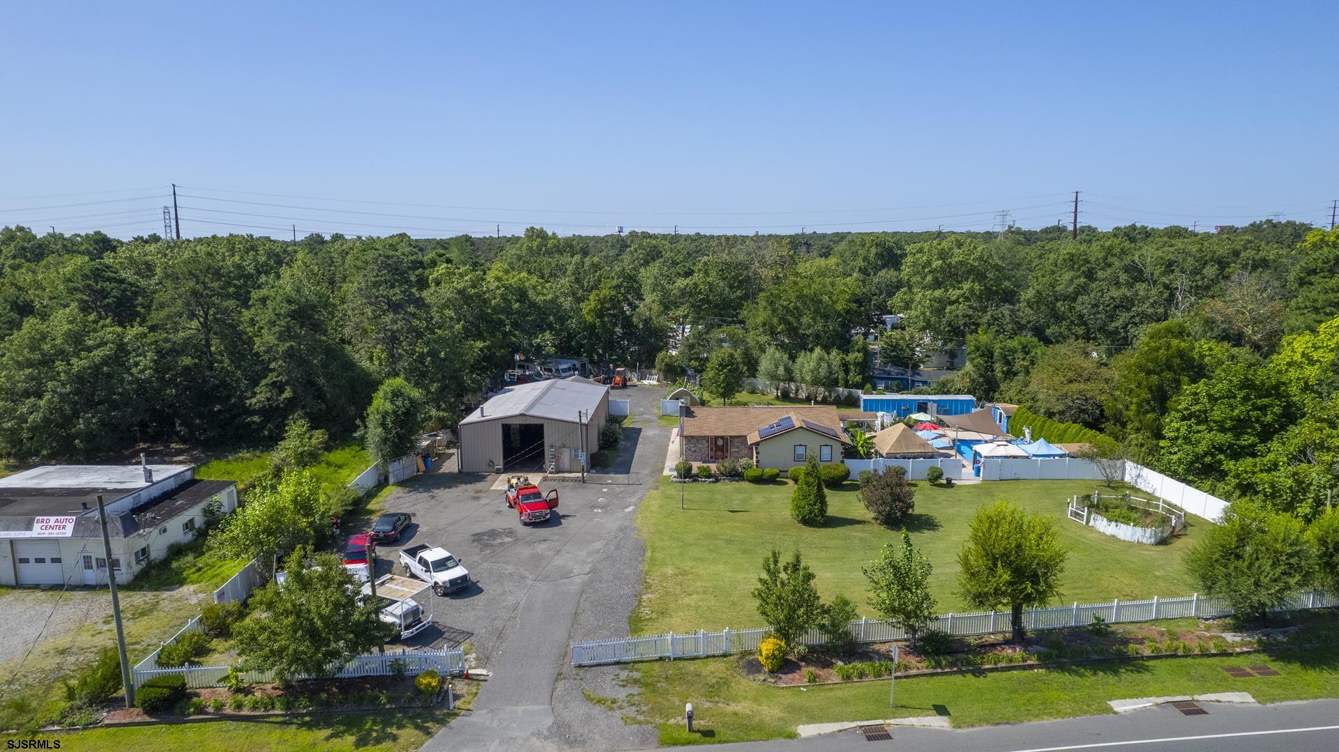 6529 Delilah Road Egg Harbor Township, NJ 08234 - Photo 62 of 70 an aerial view of a house with a garden