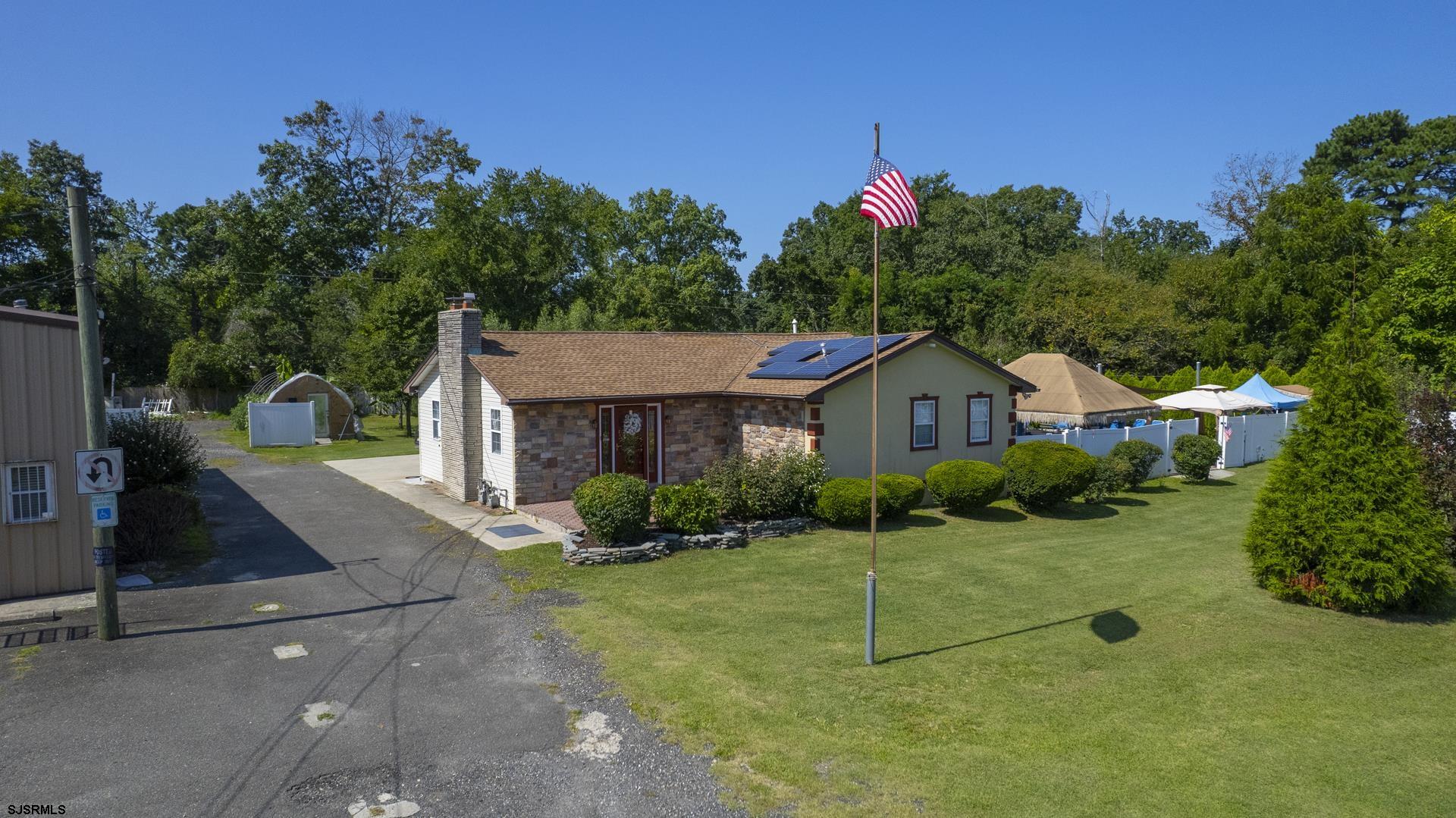 6529 Delilah Road Egg Harbor Township, NJ 08234 - Photo 65 of 70 a house view with a garden space