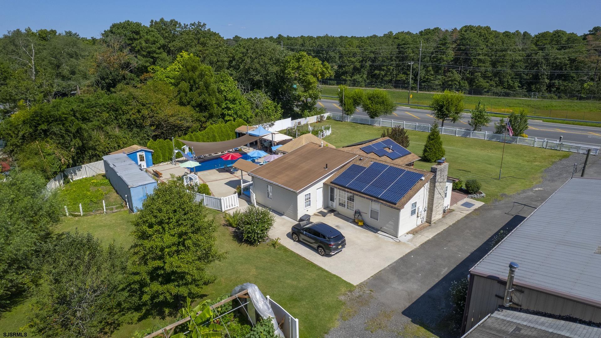 6529 Delilah Road Egg Harbor Township, NJ 08234 - Photo 67 of 70 an aerial view of a house with a big yard