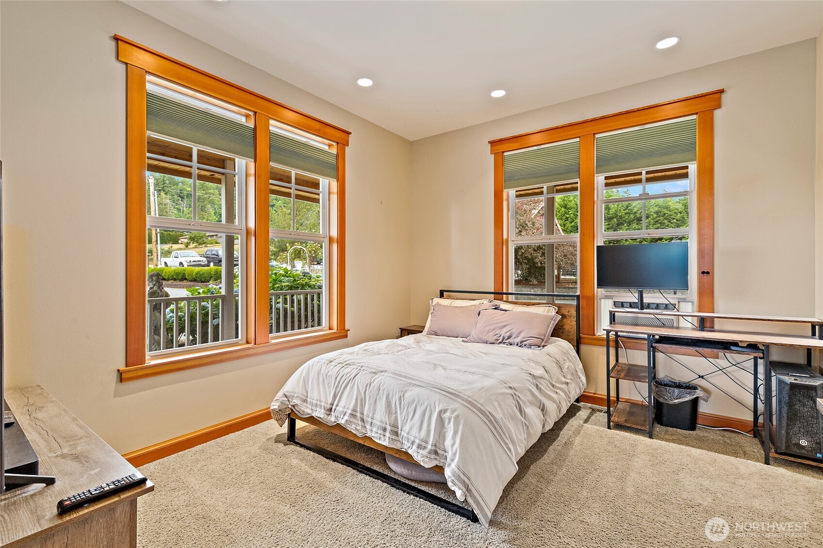 20076 Sinnes Road Mount Vernon, WA 98274 - Photo 14 of 40 a bedroom with a large bed and a large window