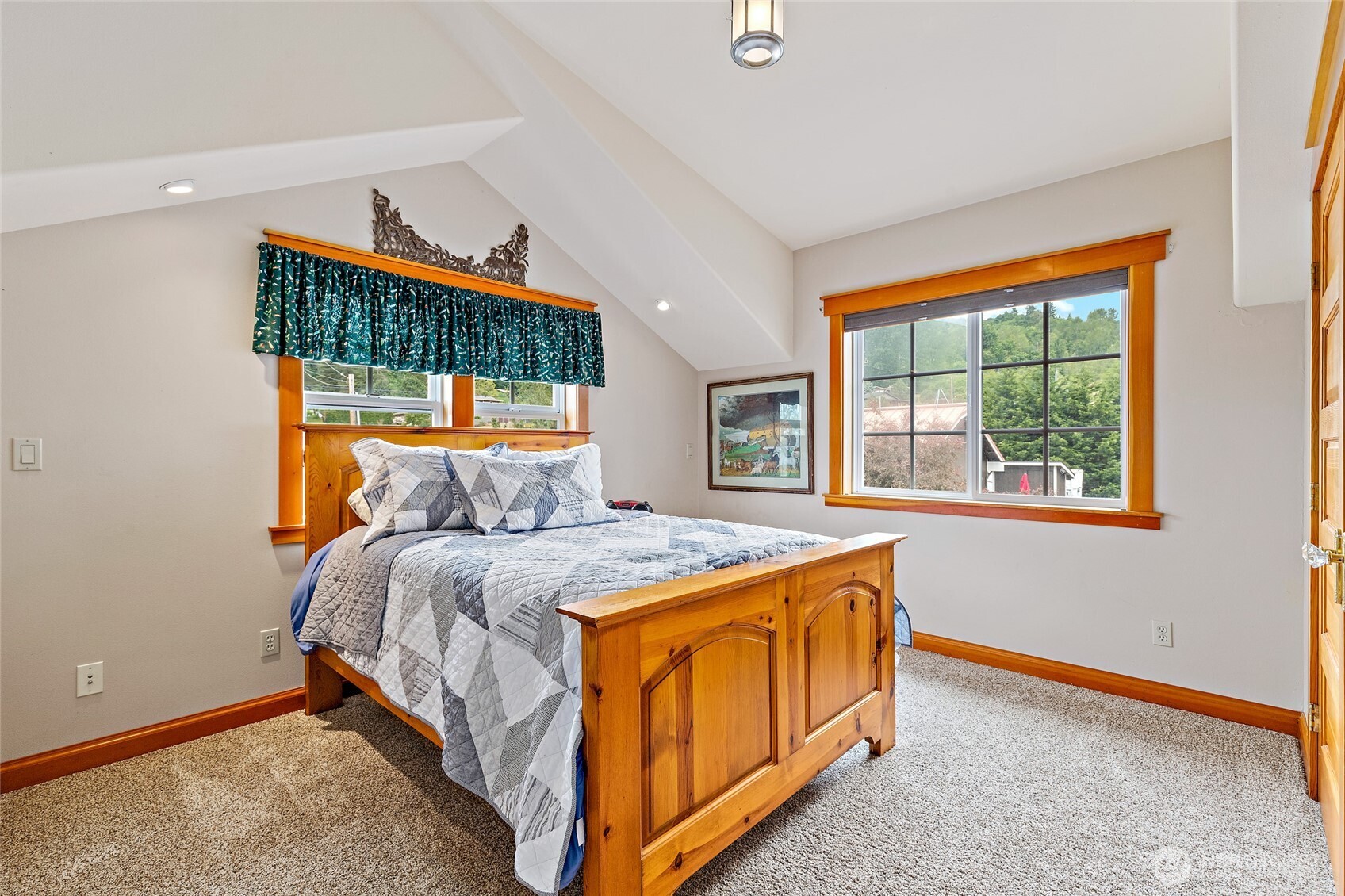 20076 Sinnes Road Mount Vernon, WA 98274 - Photo 19 of 40 a bed sitting in a bedroom next to a window