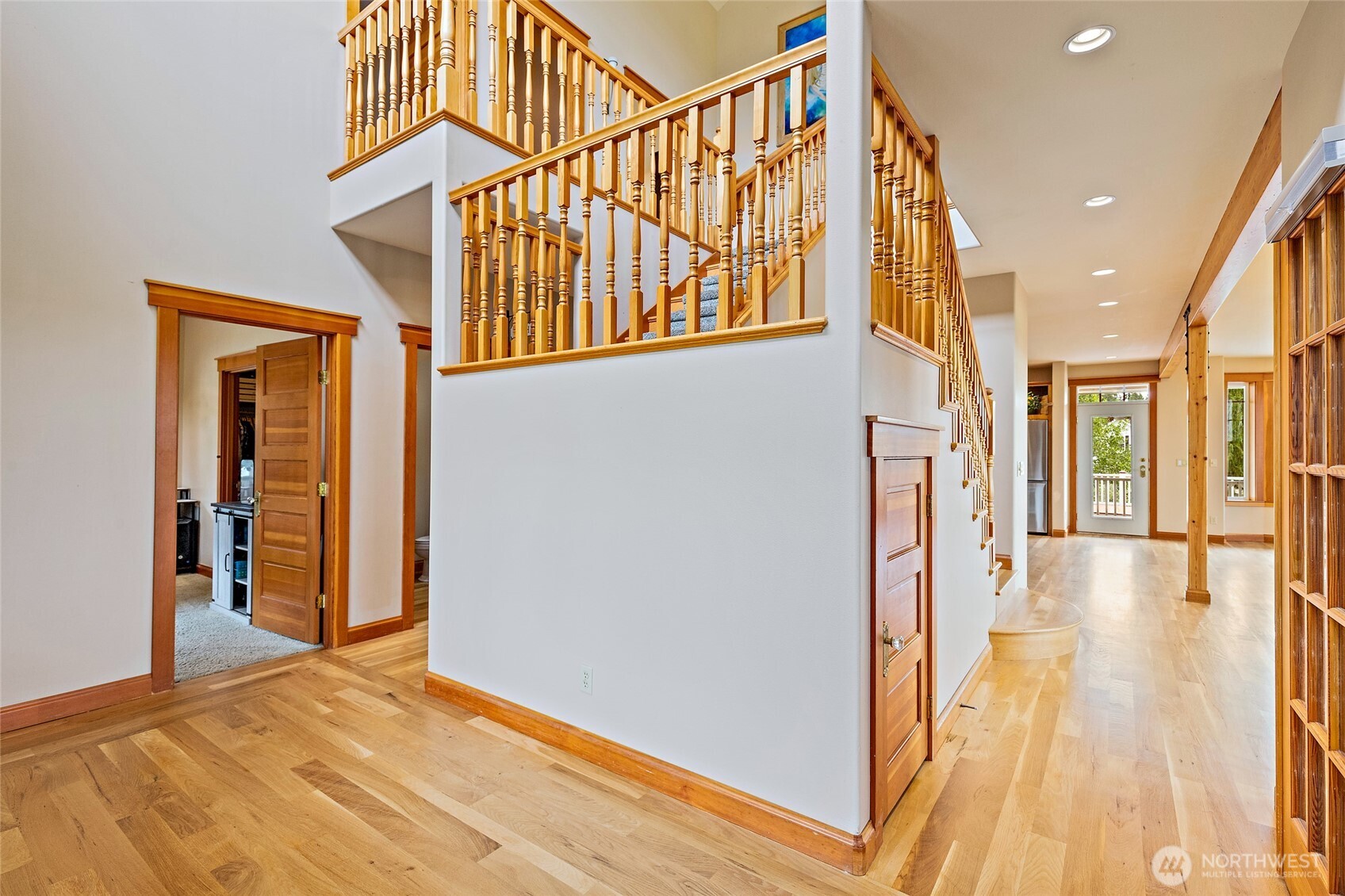20076 Sinnes Road Mount Vernon, WA 98274 - Photo 3 of 40 a view of a hallway with wooden floor and staircase