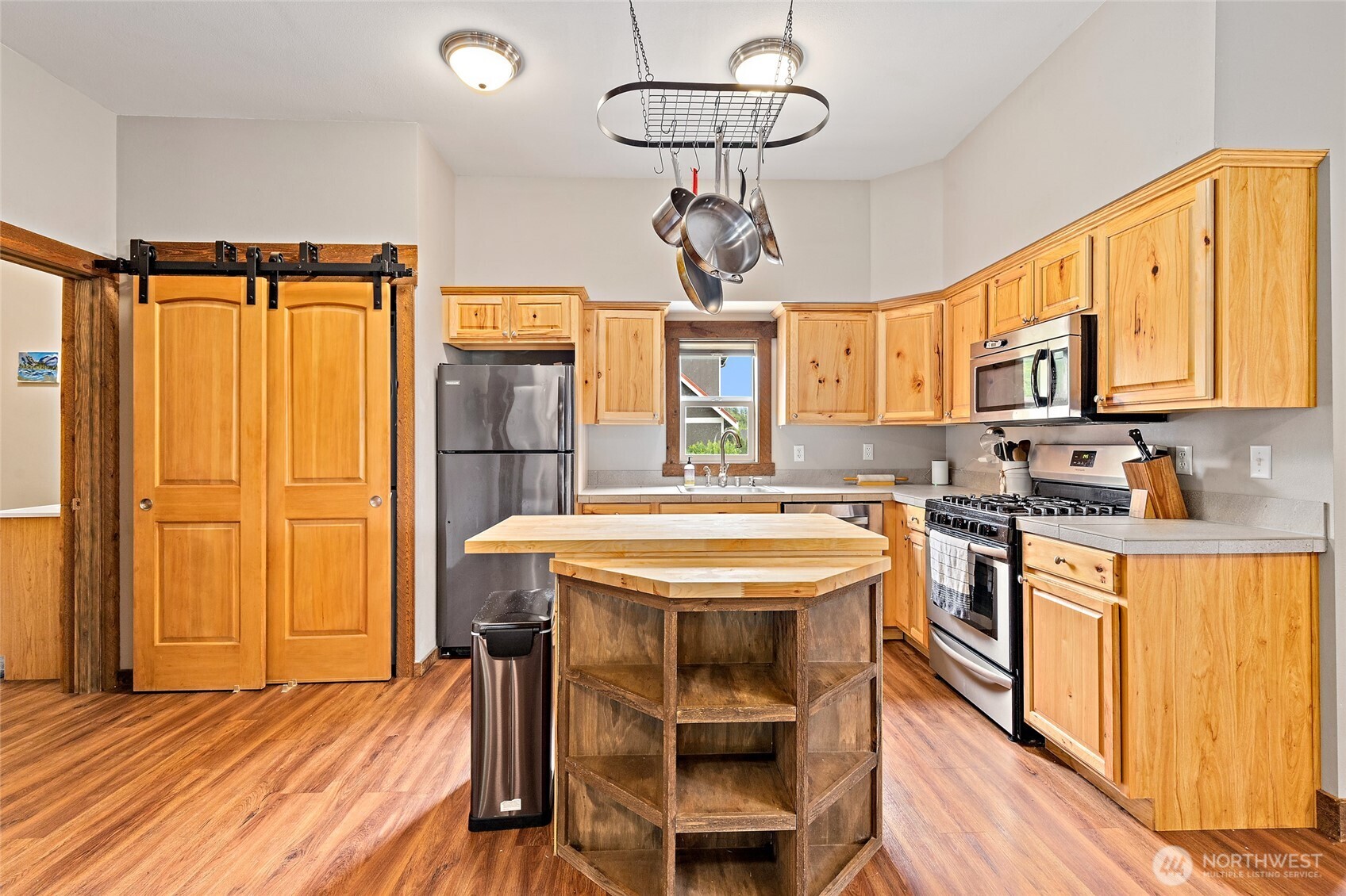 20076 Sinnes Road Mount Vernon, WA 98274 - Photo 36 of 40 a kitchen with stainless steel appliances granite countertop a sink and cabinets