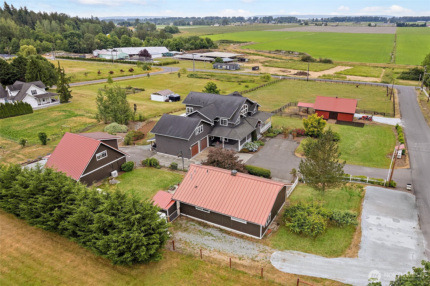 20076 Sinnes Road Mount Vernon, WA 98274 - Photo 40 of 40 an aerial view of a house with garden space and ocean view