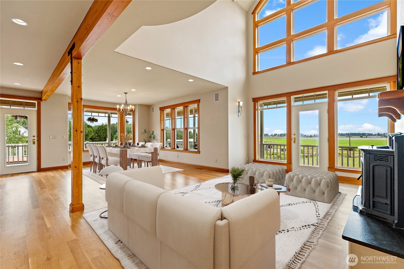 20076 Sinnes Road Mount Vernon, WA 98274 - Photo 4 of 40 a living room with furniture fireplace and a large window