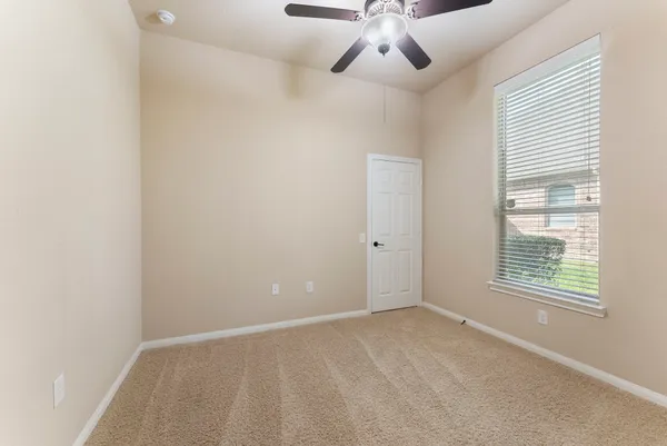 a large kitchen with stainless steel appliances granite countertop a large counter top and a stove top oven