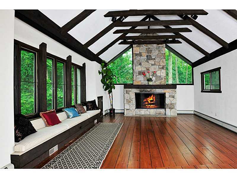 407 Round Hill Road Greenwich, CT 06831 - Photo 12 of 21 a outdoor living space with furniture and a fireplace