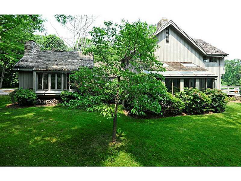 407 Round Hill Road Greenwich, CT 06831 - Photo 2 of 21 a view of an house that has garden