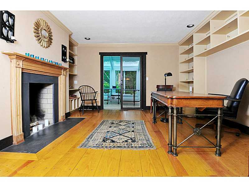 407 Round Hill Road Greenwich, CT 06831 - Photo 9 of 21 a bed room with a bed and a chandelier