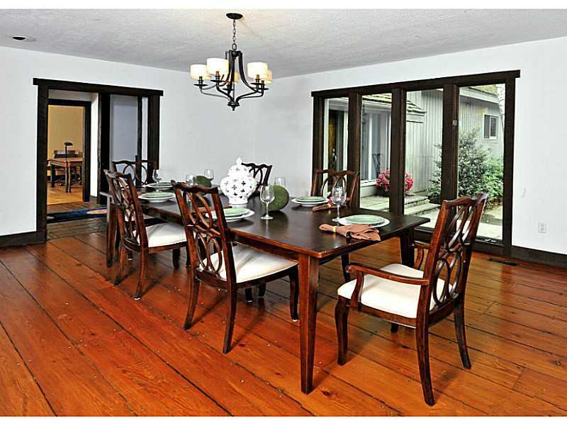 407 Round Hill Road Greenwich, CT 06831 - Photo 10 of 21 a view of a dining room with furniture window and wooden floor