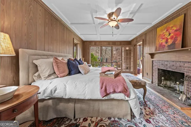 a bed room with a bed and a chandelier