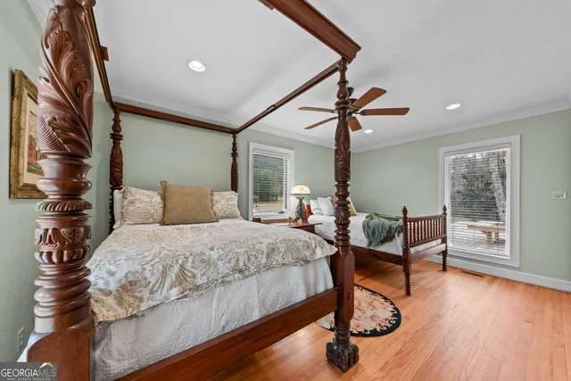 a view of a house with backyard porch and sitting area