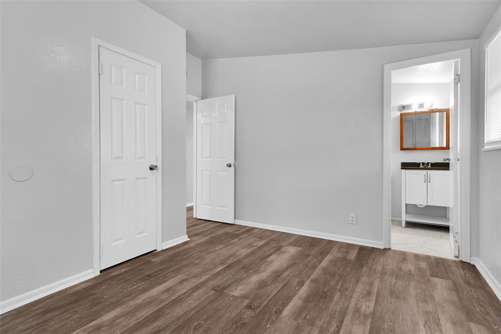 515 Forrest Lane Denison, TX 75021 - Photo 11 of 15 a view of empty room with wooden floor
