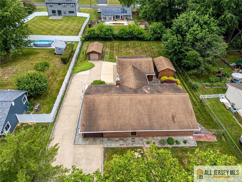 21 Tyndall Road Kendall Park, NJ 08824 - Photo 27 of 33 an aerial view of a house with swimming pool and patio