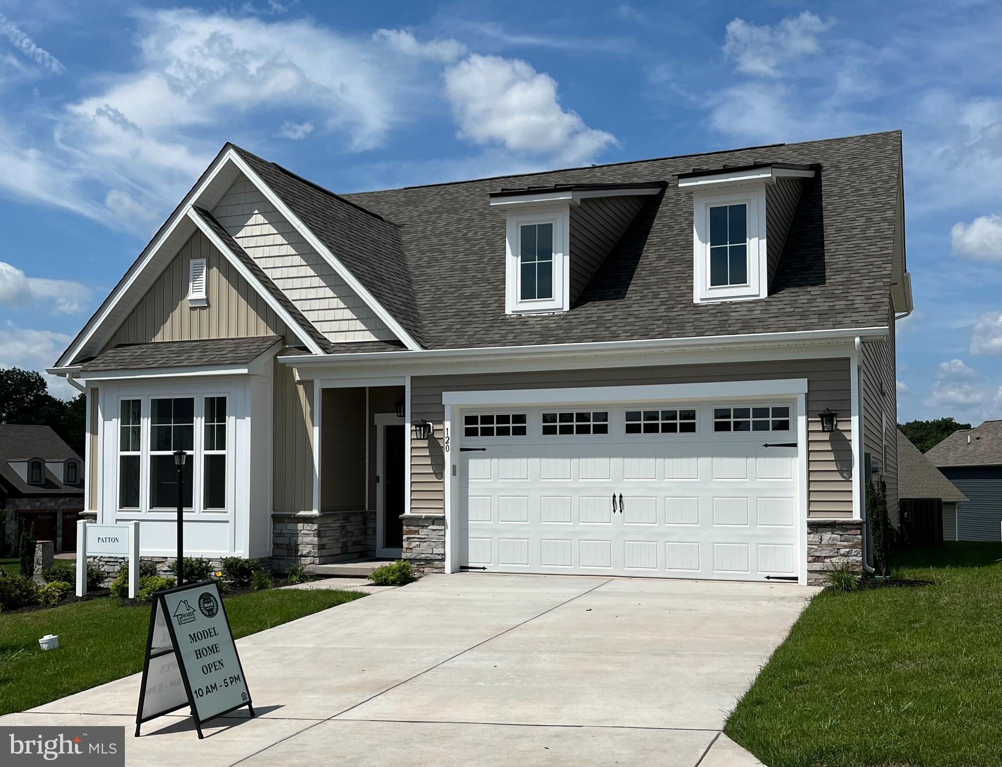 a view of house and yard