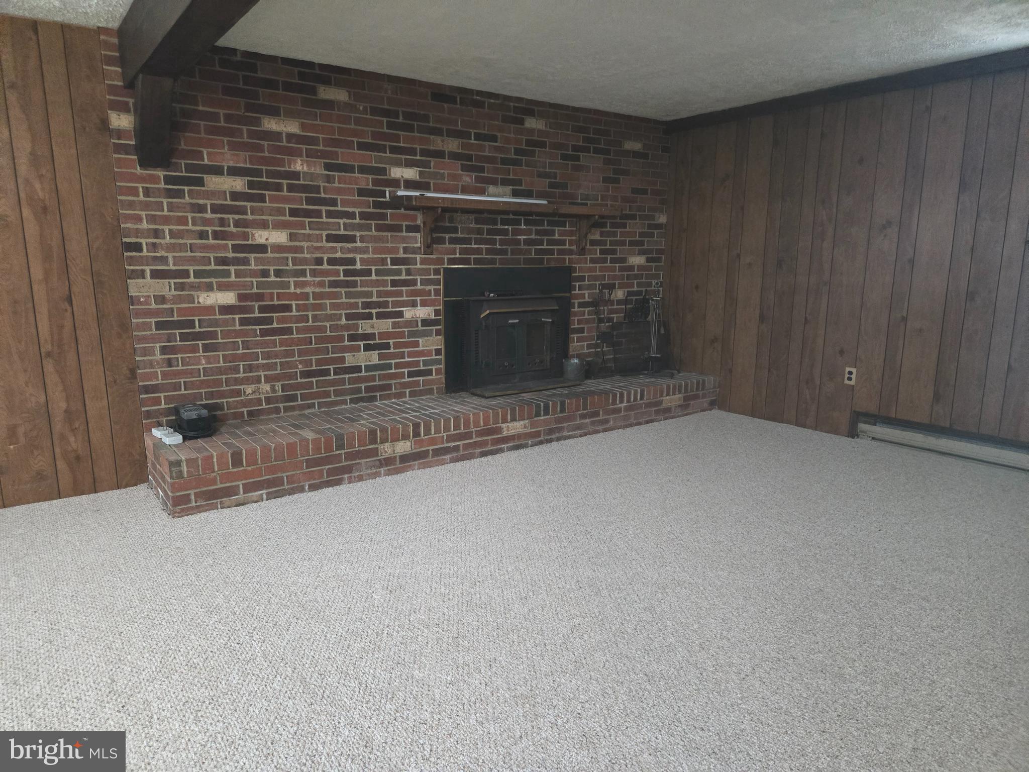 3908 Lakeside Court Dunkirk, MD 20754 - Photo 11 of 22 a view of empty room with fireplace