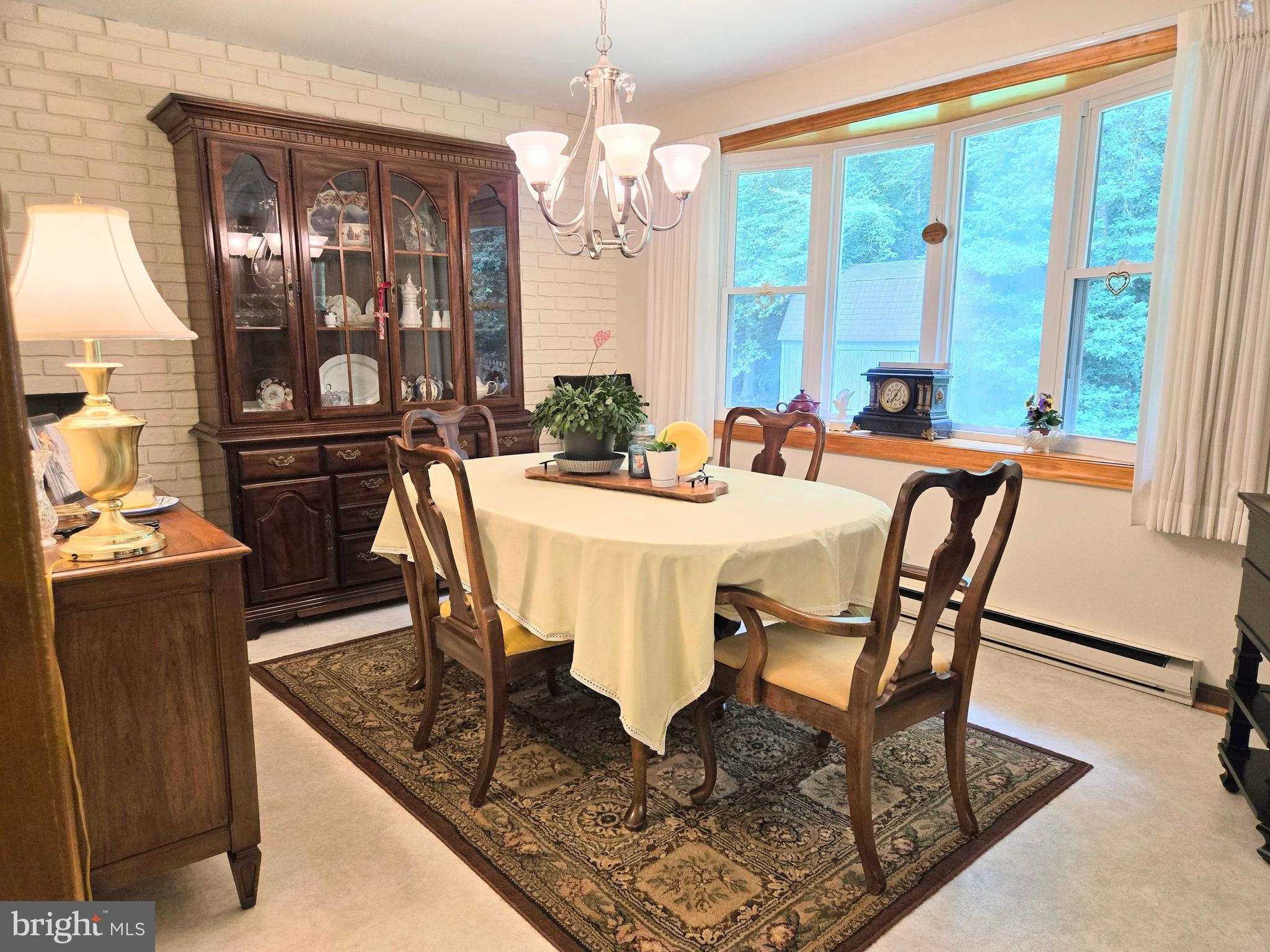 3908 Lakeside Court Dunkirk, MD 20754 - Photo 5 of 22 a view of a dining room with furniture window and outside view