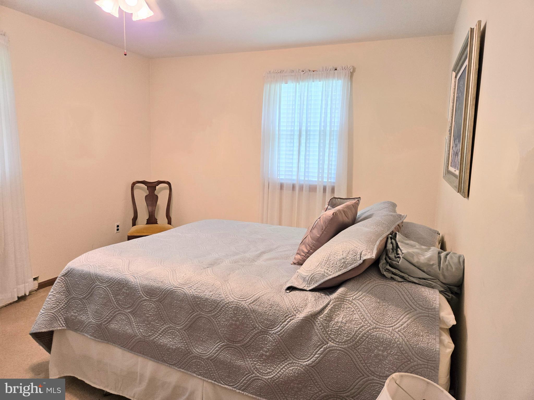 3908 Lakeside Court Dunkirk, MD 20754 - Photo 8 of 22 a bedroom with a bed and window